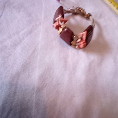 Bracelet new with wooden beads and metal elements