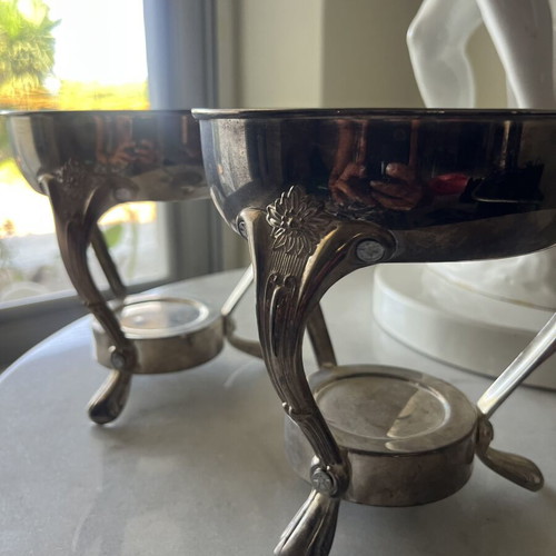 Vintage metal food warmer set with decorative legs and handles