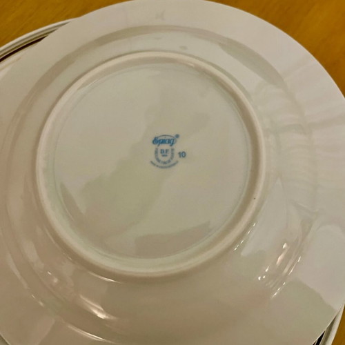 Vintage Epiag porcelain set of four plates like new