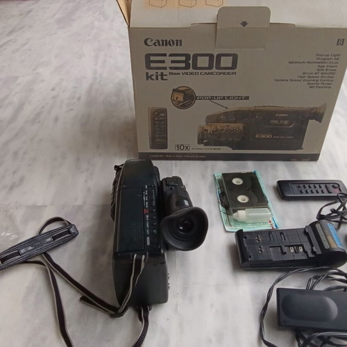 Canon E300 video camera used, non-functional, with accessories