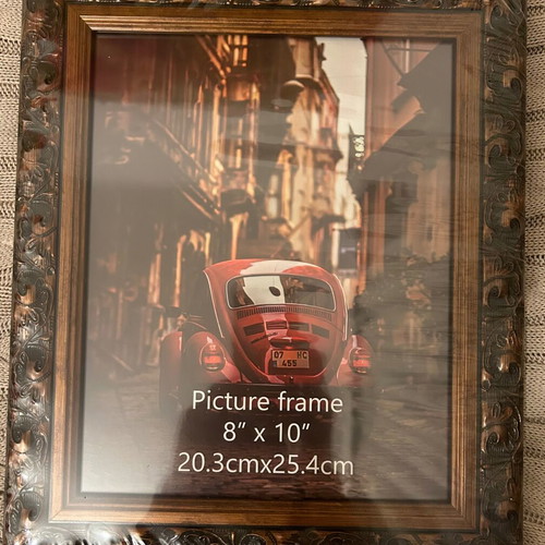 Ornate wooden frame, 20.3cmX25.4cm. Unused, can be hung or displayed.