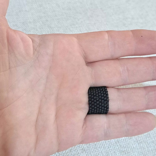 Handmade ring with black matte and silver polyhedral beads