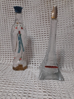 Collectible perfume bottles used from France with Eiffel Tower and Our Lady of Lourdes