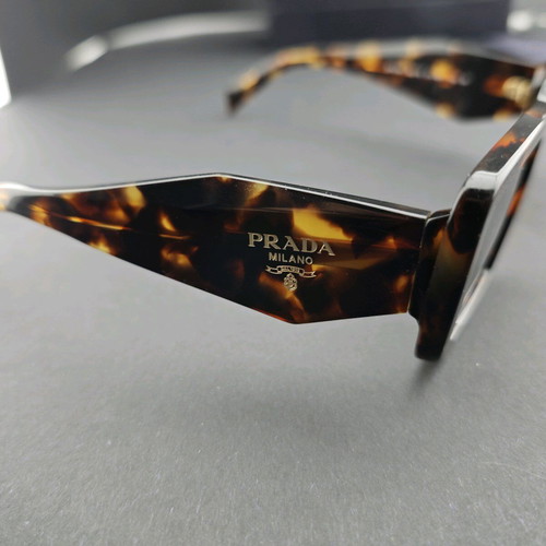 Prada sunglasses used with original box and case