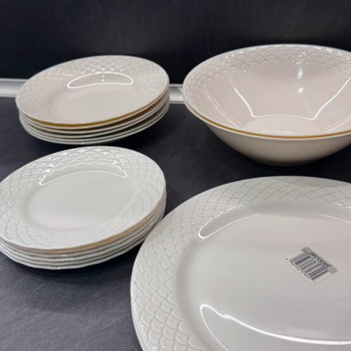 Porcelain dinnerware set with embossed design, like new