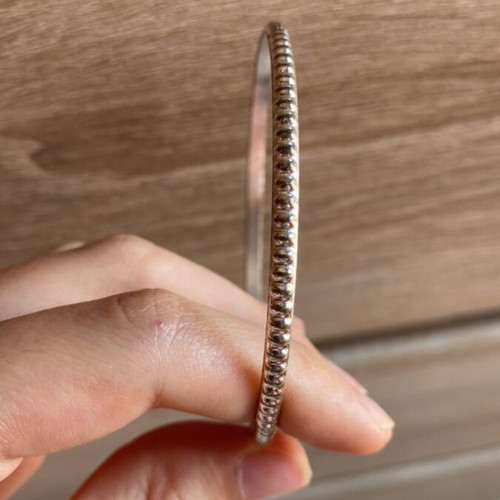 Metal bracelet like new, silver color with rounded protrusions