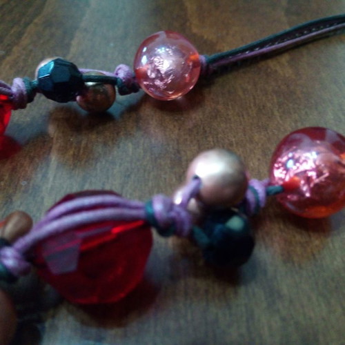 Alternative long necklace with red beads used
