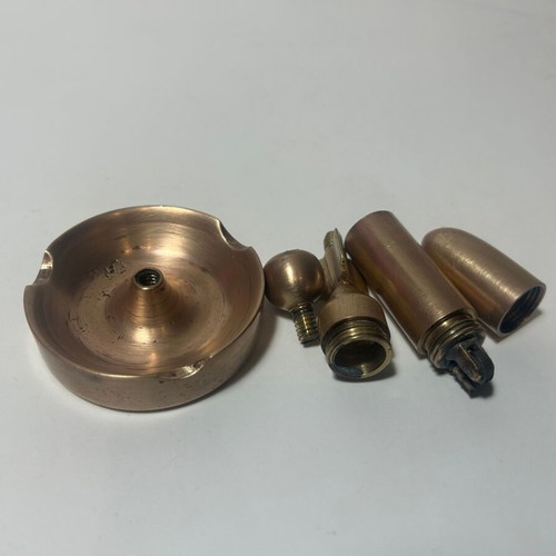 Bronze bullet-shaped ashtray lighter used