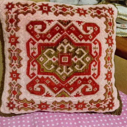 Handmade vintage folk figure pillow used