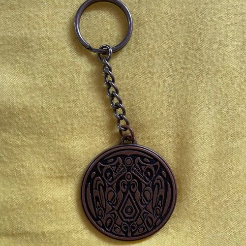 New Moon keychain used, black and brown