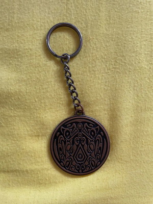 New Moon keychain used, black and brown