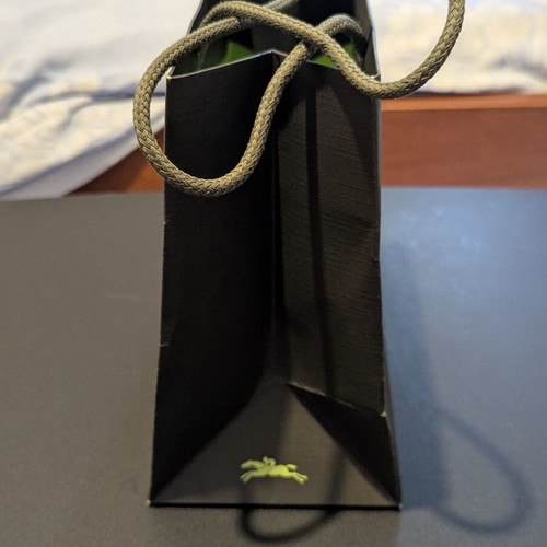 Longchamp paper bag like new, approx. 19x18 cm