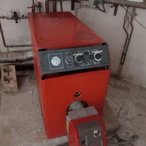 Complete oil heating system used with boiler burner and tank