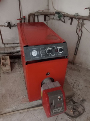Complete oil heating system used with boiler burner and tank