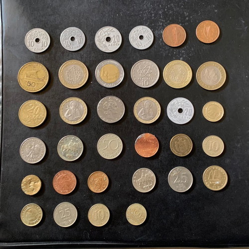Set collection of various coins and banknotes used