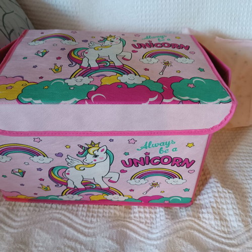 Pink fabric storage box with unicorn design