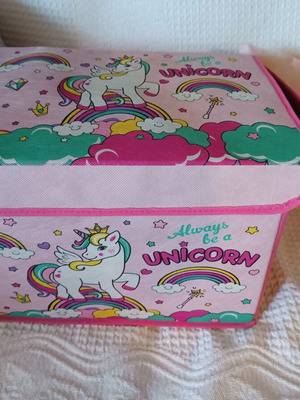 Pink fabric storage box with unicorn design