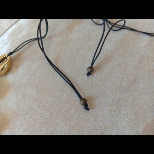 Gold necklace with shells like new