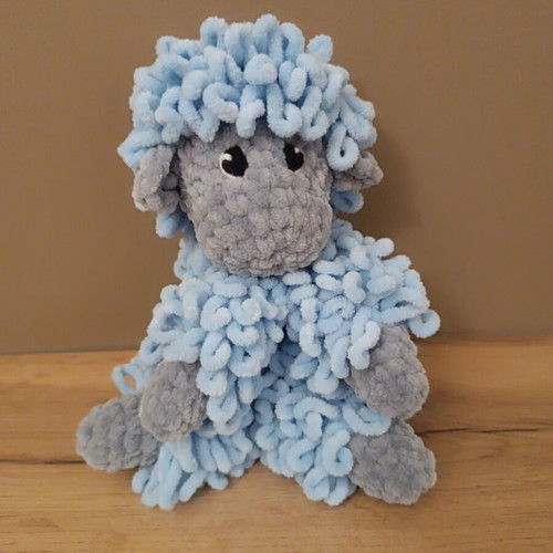 Handmade knitted cuddly sheep with soft velour yarn