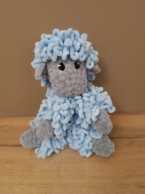 Handmade knitted cuddly sheep with soft velour yarn