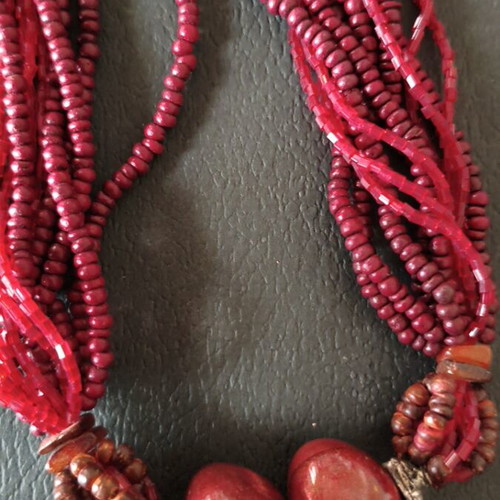 Necklace like new, handmade multistrand with red beads and marble-like stones