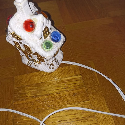 Small white church-shaped lamp with multicolor lights like new