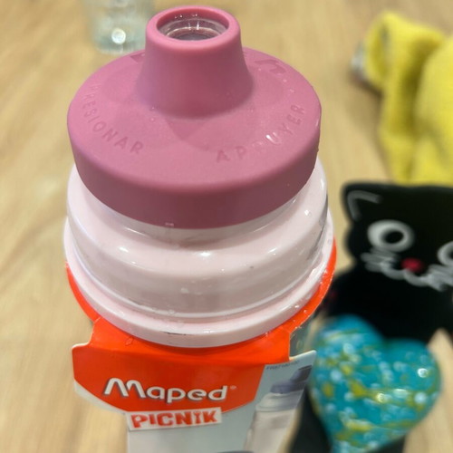 Maped 500 ml water bottle new with 6 Maped erasers gift pink