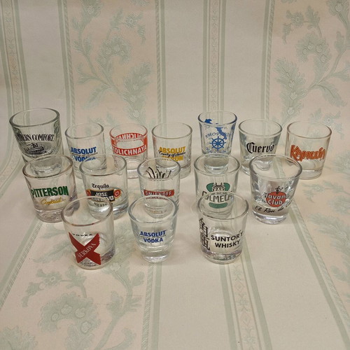 Collection of 87 shot glasses new, promotional and collectible