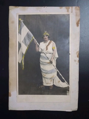 Photograph used with allegorical woman holding flag, 1920-30