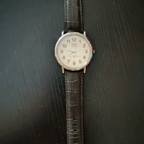 Quartz wristwatch men's used, black