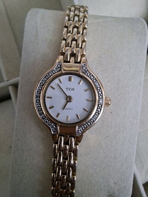 TCM women's watch used, gold-tone with minor scratch on glass