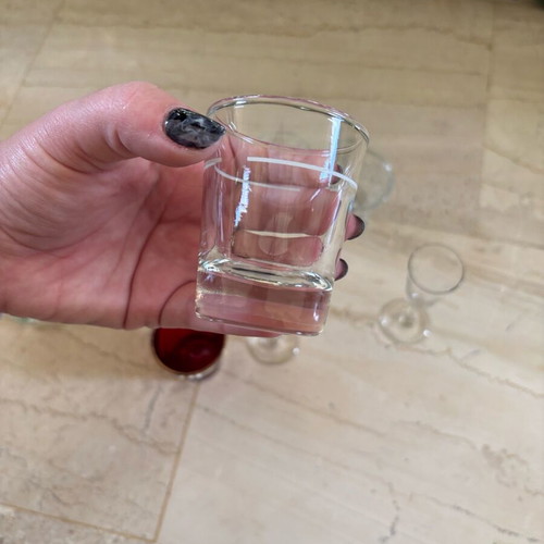 Set of 9 shot glasses like new, various designs