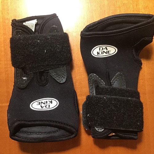 Da Kine wrist guards used for snowboard, skateboard, rollerblades