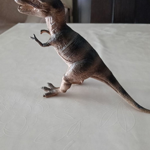 Set of 24 dinosaur figures in various sizes