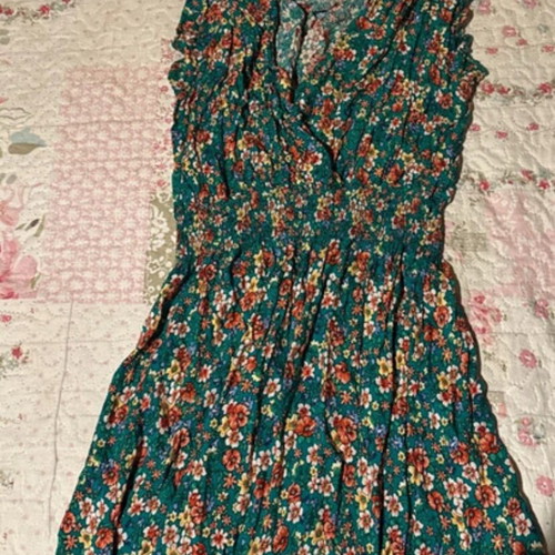 Floral dress used, green, fits small and medium sizes