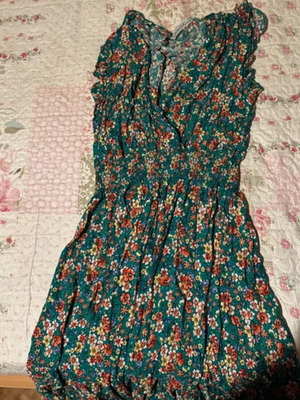 Floral dress used, green, fits small and medium sizes