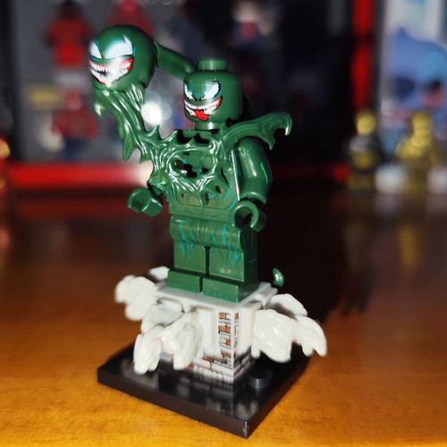 Lasher Symbiote figure like new with base and effects