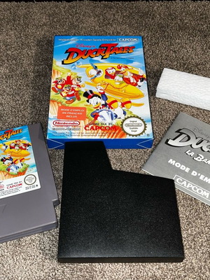 Nintendo NES DuckTales game like new with cartridge, box, and manual