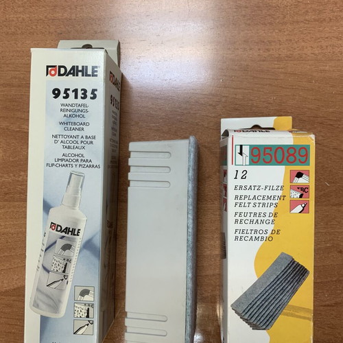 Whiteboard kit like new with cleaner, sponge, and 12 replacement felt strips