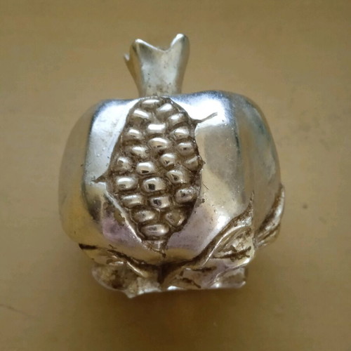 Embossed metal decorative pomegranate vintage used