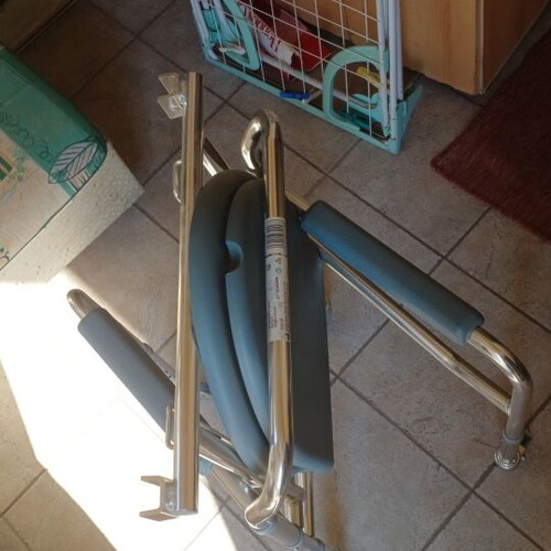 Folding commode chair with wheels