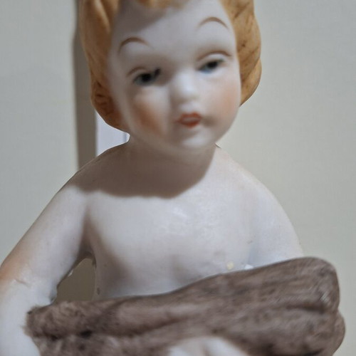 Porcelain figurine of a child vintage, like new