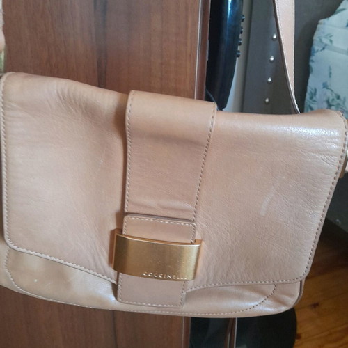 Coccinelle crossbody bag like new, tan color