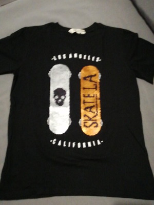 T-shirt with color-changing sequins, size 12-14, like new