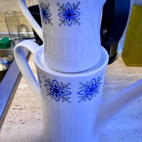 Vintage coffee/tea pot and creamer with blue floral design like new