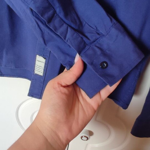 Kimmen’s blue shirt size S used with minor wear