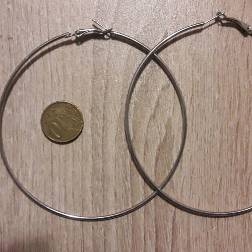 Large hoop earrings used