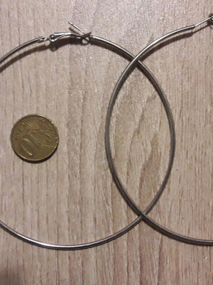 Large hoop earrings used