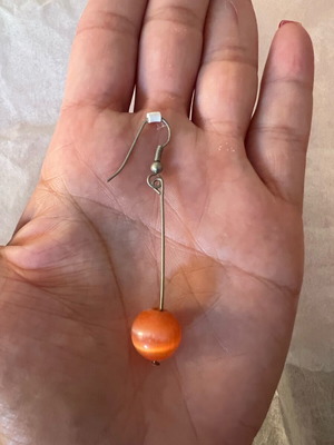 Earrings with orange bead like new, silver