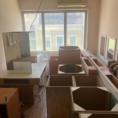 Hair salon items used, mirrors, furniture and chairs